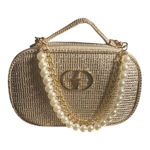 Dior holiday makeup pouch 2025 limited edition with added Pearl Chain.